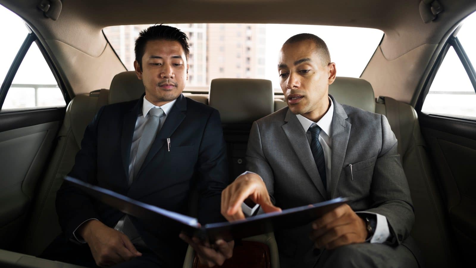 Business Men Talk Report Inside Car